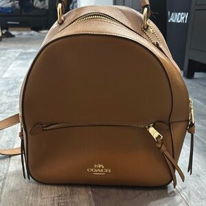 Coach Brown Leather Backpack with Structured Design